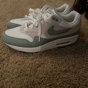 Sage green Nike shoes